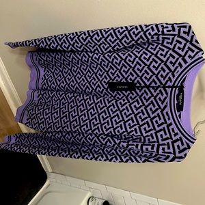 Never worn tags still on it. Got it as a Christmas gift but it is to big for me.